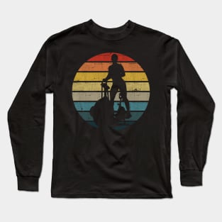 Exercise Bike Silhouette On A Distressed Retro Sunset product Long Sleeve T-Shirt